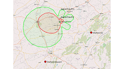 Interference and coverage map created with SPECTRAemo, showing airport communication zones and interfering transmitters